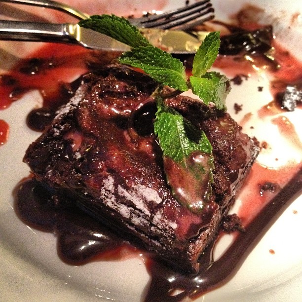 A chocolate brownie I had as dessert for my brothers birthday meal. 