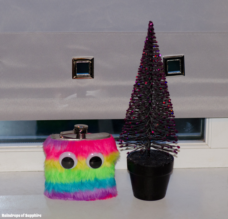 urban-outfitters-rainbow-fur-eyes-hip-flask-purple-glitter-christmas-tree