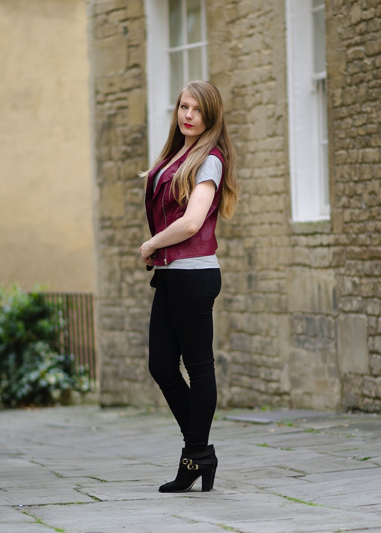 black-skinny-jeans-red-leather-vest