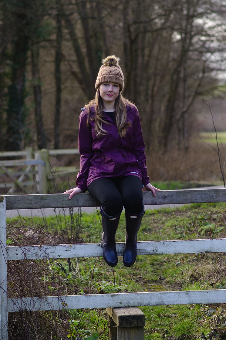 girl-sat-on-country-fence