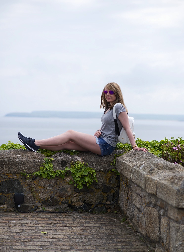 girl-sitting-on-wall